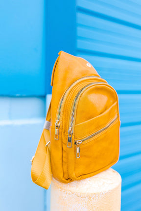 Follow Your Own Path Sling Bag In YELLOW GOLD**